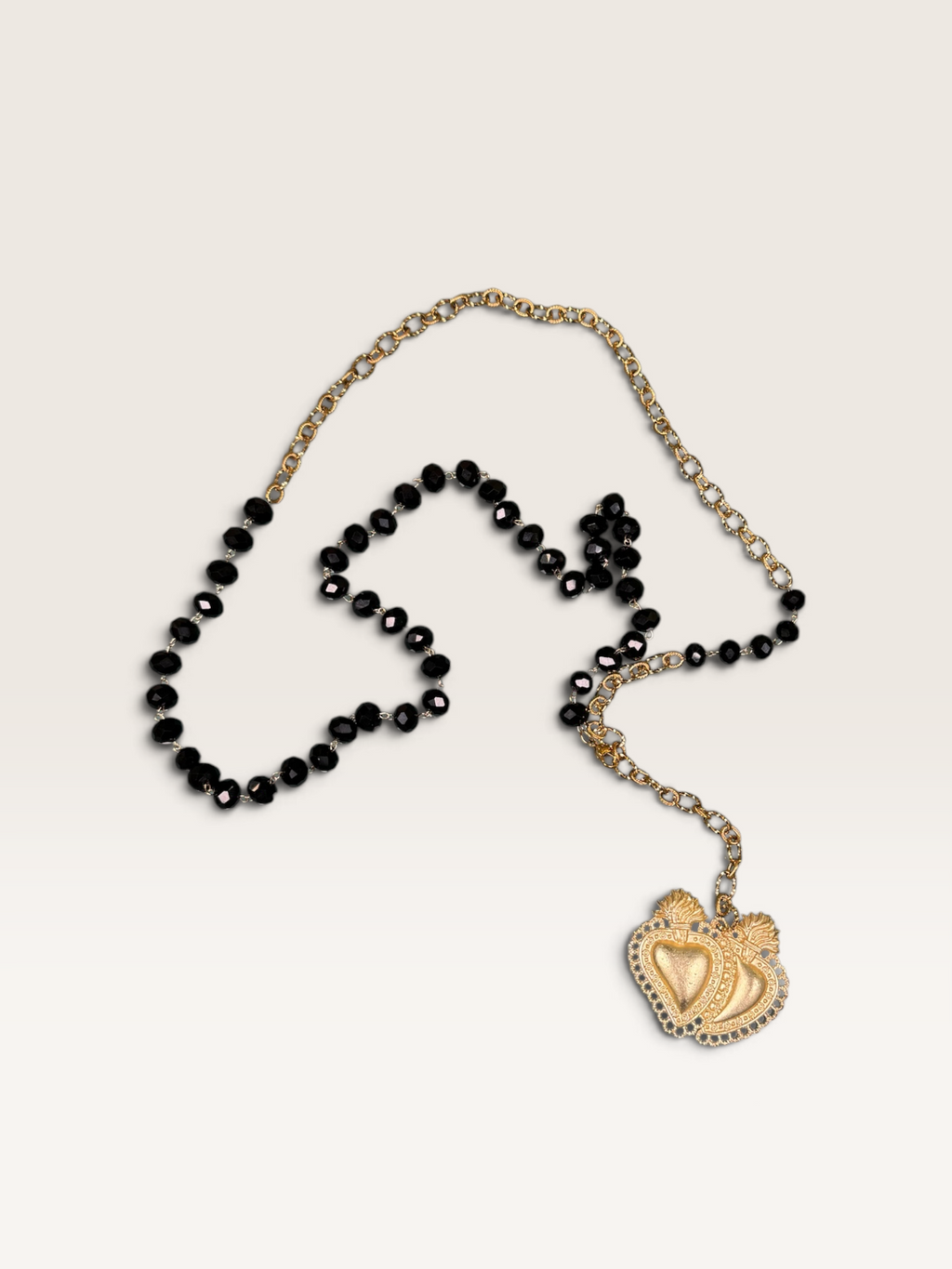 Collana con Cristalli Neri e Cuore Sacro in Zama